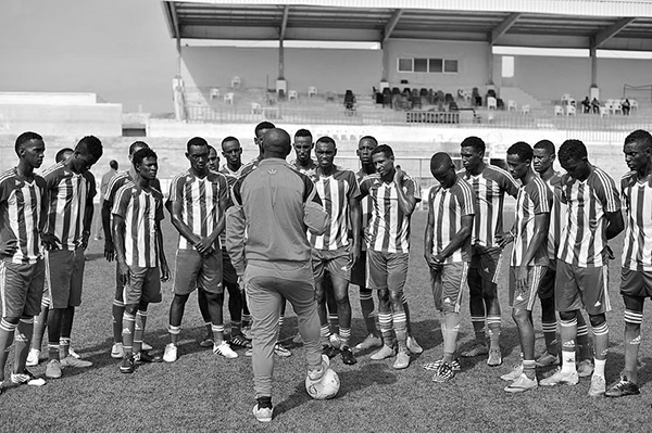 Somalia national team talks with coach Livingstone Mbabazi. Source: commons.wikimedia.org